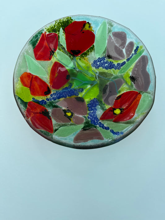 Fused glass bowl of poppies